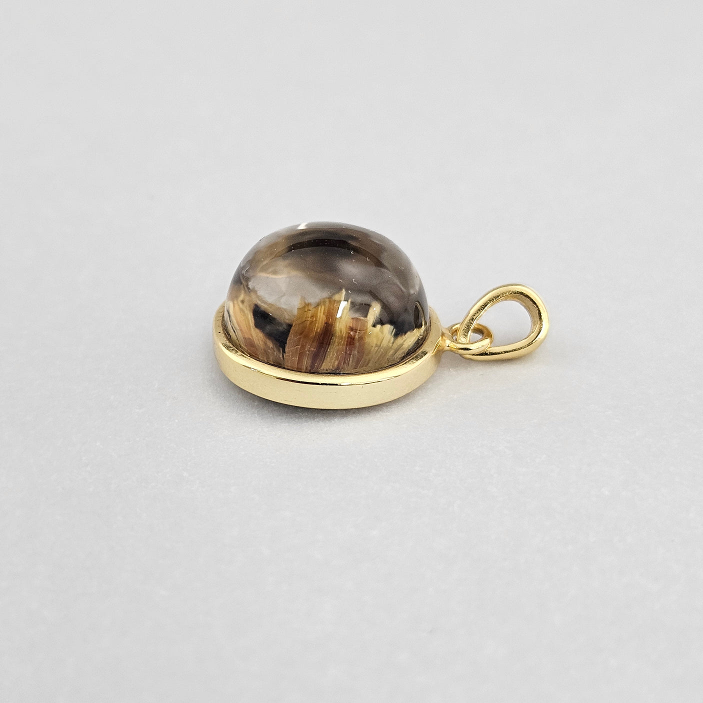 キャッツアイタイチンルチルペンダントトップ 約15x14mm 【会長秘蔵コレクション】<0103>