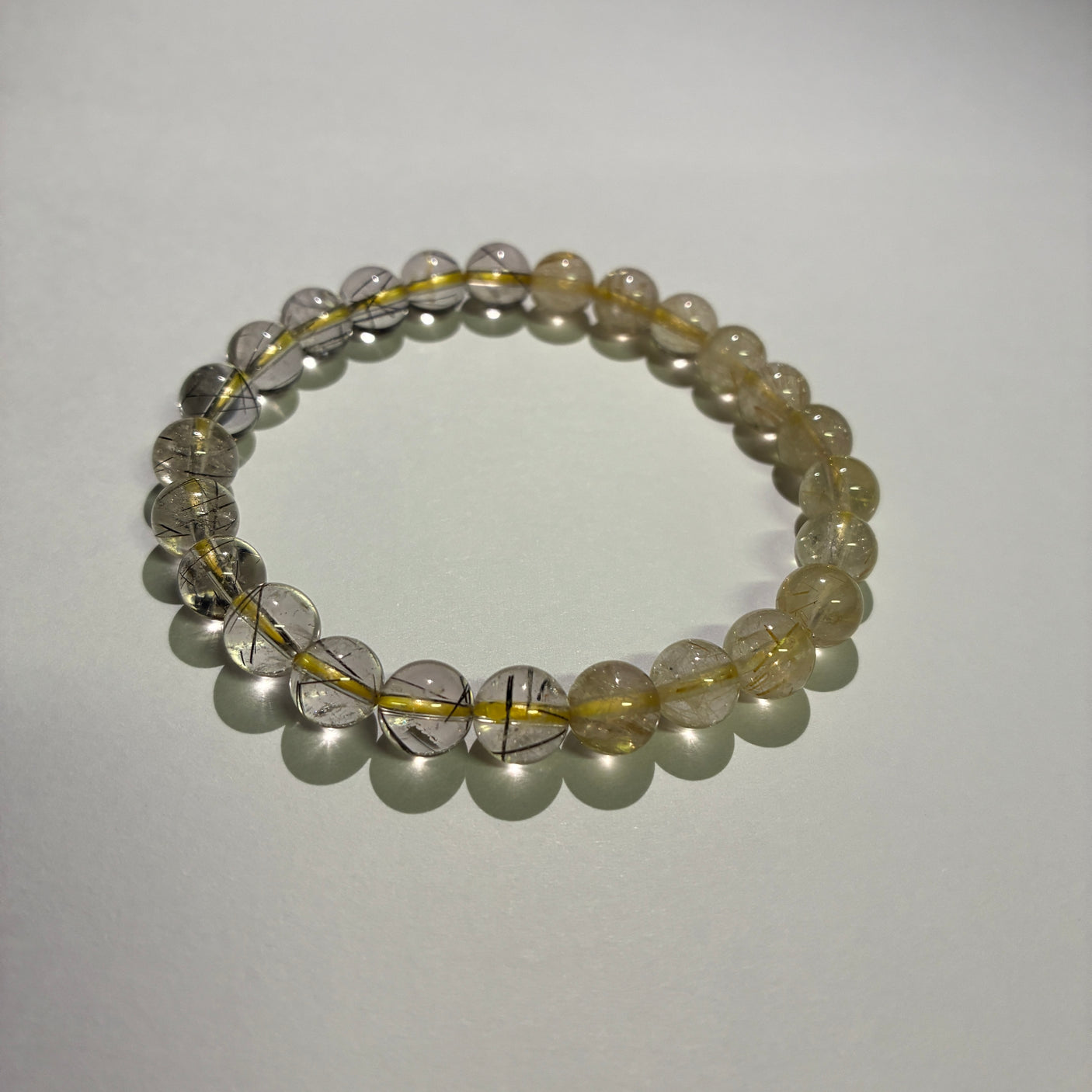 【ルチルヒカルモデル】ゴールドルチル × ブラックルチル (ゴールド約7.5mm、ブラック約7.5〜8.0mm) ブレスレット