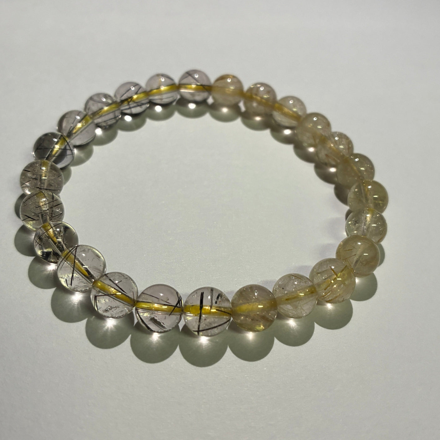 【ルチルヒカルモデル】ゴールドルチル × ブラックルチル (ゴールド約7.5mm、ブラック約7.5〜8.0mm) ブレスレット